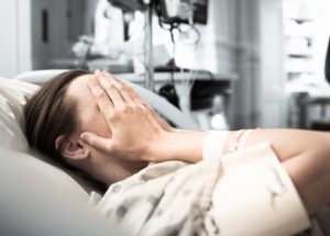 stressed young woman patient at the hospital